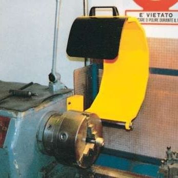 A lathe chuck guard in its open state.