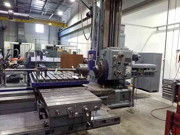 Example of a horizontal boring mill without any safety guarding.