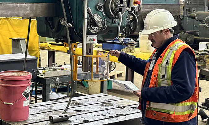 A Ferndale Safety engineer performing a machine safeguarding assessment