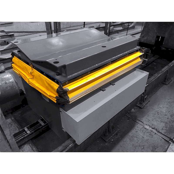 A specialized lift table, completely retracted. Showcasing what a retracted safety below on the scissor mechanism looks like.