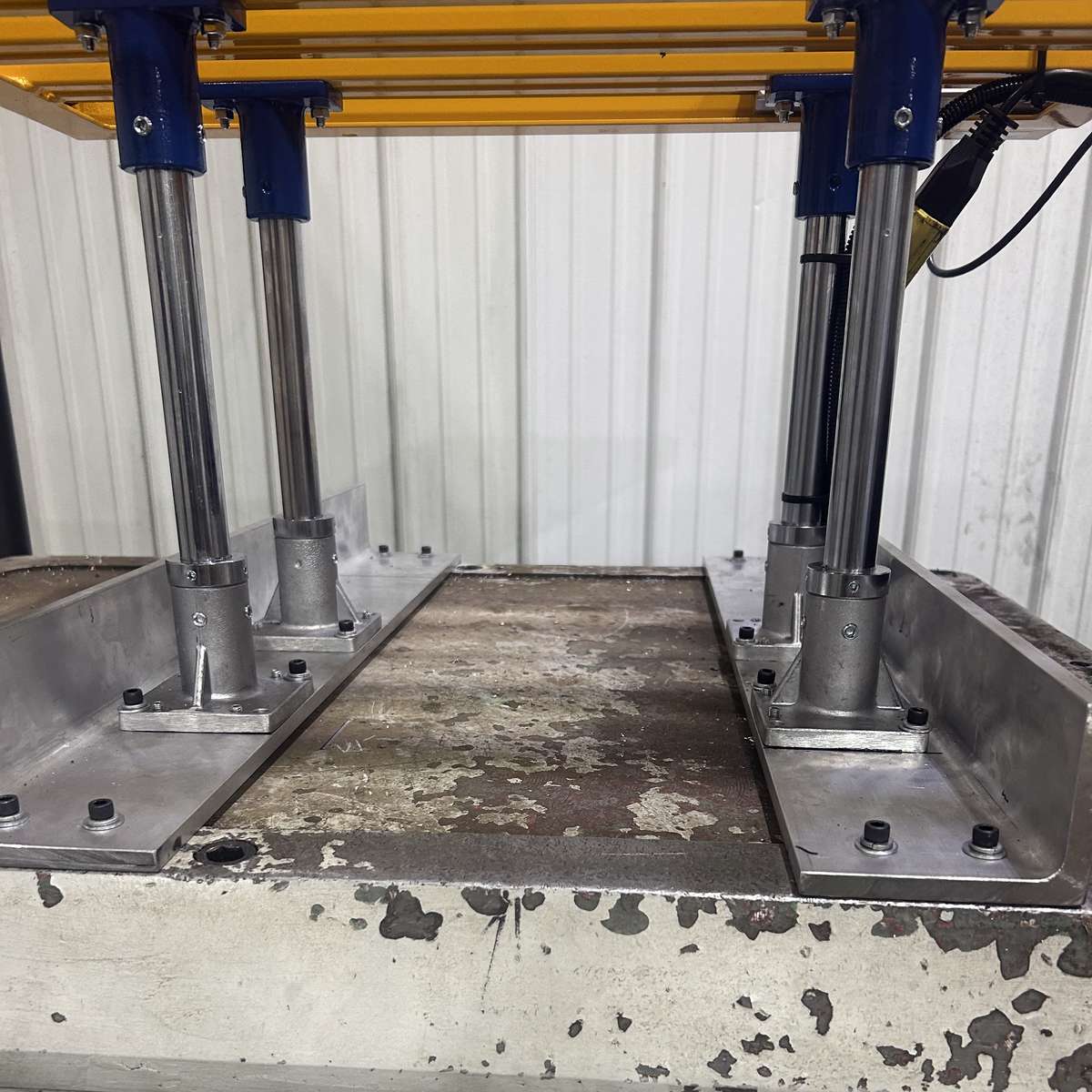 A closeup of the mounting feet on the Ferndale Safety sliding lathe chuck guard, which shows how the safety guard is mounted on top of the headstock.